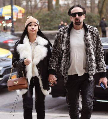 Erika Koike's ex-husband Nicolas Cage with his current wife Riko Shibata